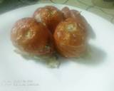 A picture of step 8 of Oven baked stuffed tomatoes.