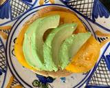 A picture of step 4 of Tomato and avocado on toasted bagel with grated egg.