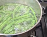 A picture of step 5 of Green beans (cumin, tomato + garlic).