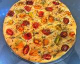 A picture of step 8 of Foccacia with cherry tomatoes, rosemary and pomegranate molasses.