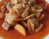 A picture of step 5 of Meat with onions stew.